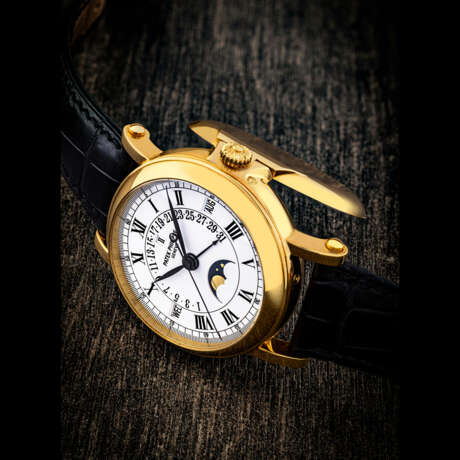 PATEK PHILIPPE. AN 18K GOLD AUTOMATIC PERPETUAL CALENDAR WRISTWATCH WITH SWEEP CENTRE SECONDS, RETROGRADE DATE, MOON PHASES AND LEAP YEAR INDICATION - фото 1