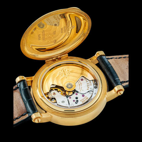 PATEK PHILIPPE. AN 18K GOLD AUTOMATIC PERPETUAL CALENDAR WRISTWATCH WITH SWEEP CENTRE SECONDS, RETROGRADE DATE, MOON PHASES AND LEAP YEAR INDICATION - photo 3