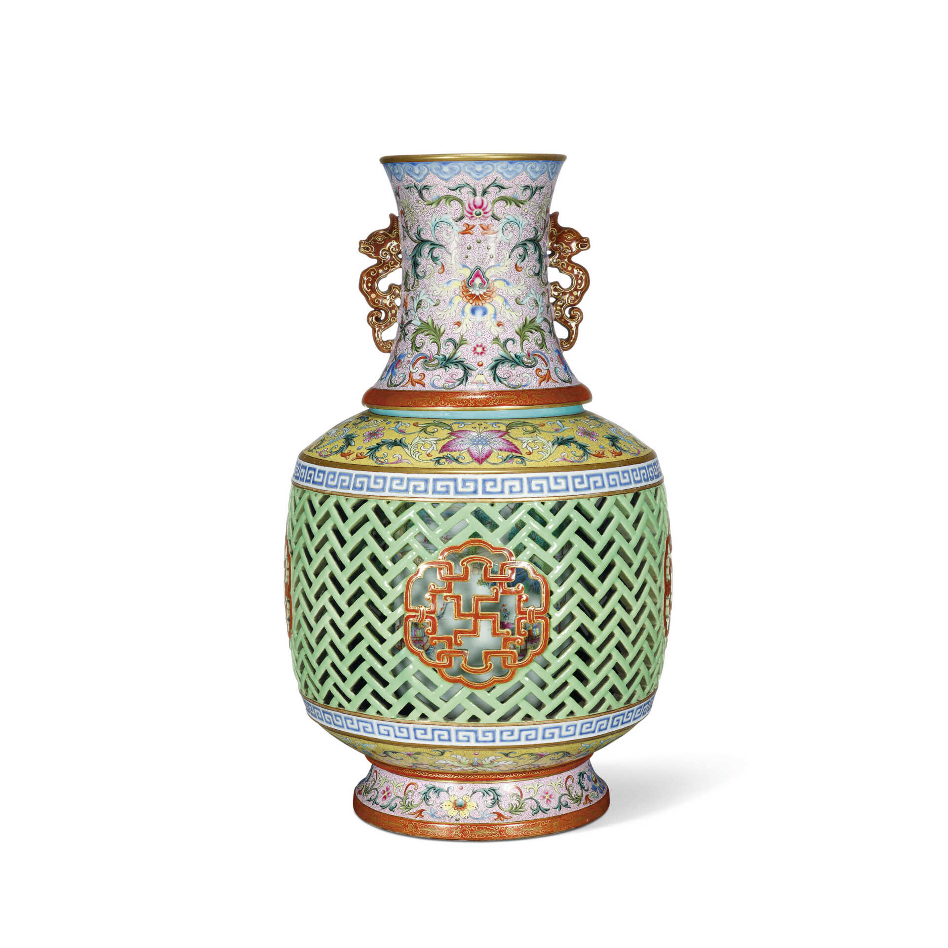 A MAGNIFICENT YANGCAI RETICULATED AND ROTATING ‘DRAGON BOAT’ VASE