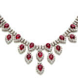 Round diamond and oval ruby white g… - фото 2