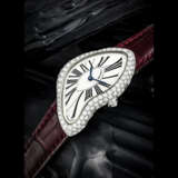 CARTIER. A RARE 18K WHITE GOLD AND DIAMOND-SET ASYMMETRICAL WRISTWATCH - Foto 1