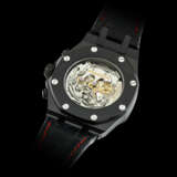 AUDEMARS PIGUET. A VERY RARE BLACK COATED STAINLESS STEEL TOURBILLON CHRONOGRAPH LIMITED EDITION WRISTWATCH - photo 2