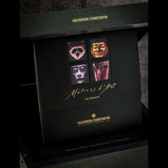 VACHERON CONSTANTIN. A WOODEN PRESENTATION BOX, MADE FOR THE METIERS D’ARTS “LES MASQUES” EDITION 2008 SET OF FOUR WATCHES