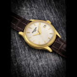 PATEK PHILIPPE. AN 18K GOLD AUTOMATIC WRISTWATCH WITH SWEEP CENTRE SECONDS AND DATE - Foto 1