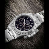 ROLEX. A STAINLESS STEEL AUTOMATIC CHRONOGRAPH WRISTWATCH WITH BRACELET - Foto 1