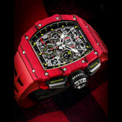 RICHARD MILLE. A RED QUARTZ-TPT&#174; AUTOMATIC SEMI-SKELETONISED FLYBACK CHRONOGRAPH WRISTWATCH WITH ANNUAL CALENDAR