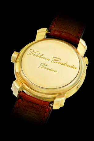 VACHERON CONSTANTIN. AN 18K GOLD AUTOMATIC DUAL TIME WRISTWATCH WITH DATE AND REGULATOR-STYLE DIAL - photo 2