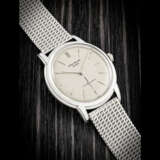 PATEK PHILIPPE. A VERY RARE 18K WHITE GOLD AUTOMATIC WRISTWATCH WITH BRACELET - Foto 1