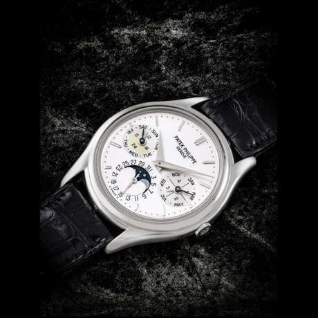 PATEK PHILIPPE. AN 18K WHITE GOLD AUTOMATIC PERPETUAL CALENDAR WRISTWATCH WITH MOON PHASES, 24 HOUR AND LEAP YEAR INDICATION - фото 1