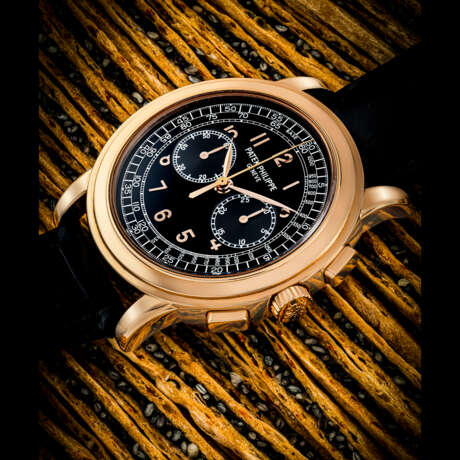 PATEK PHILIPPE. AN EXCEEDINGLY RARE AND HIGHLY ATTRACTIVE 18K PINK GOLD CHRONOGRAPH WRISTWATCH WITH BLACK DIAL - photo 1