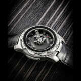 ULYSSE NARDIN. AN UNUSUAL AND RARE 18K WHITE GOLD LIMITED EDITION CARROUSEL TOURBILLON WRISTWATCH WITH DATE - photo 1