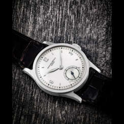 PATEK PHILIPPE. A RARE STAINLESS STEEL WRISTWATCH WITH TWO TONE DIAL