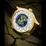 PATEK PHILIPPE. A RARE AND SUPERB 18K GOLD AUTOMATIC WORLD TIME WRISTWATCH WITH CLOISONN&#201; ENAMEL DIAL - photo 1