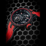 ROGER DUBUIS. A CARBON AND TITANIUM TOURBILLON LIMITED EDITION SKELETONISED WRISTWATCH - photo 1