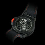 ROGER DUBUIS. A CARBON AND TITANIUM TOURBILLON LIMITED EDITION SKELETONISED WRISTWATCH - photo 2