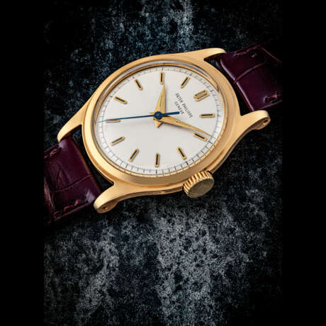 PATEK PHILIPPE. A RARE 18K GOLD WRISTWATCH WITH SWEEP CENTRE SECONDS AND RADIUM INDEXES - photo 1