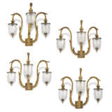 A SET OF FOUR GILT-BRONZE LARGE THREE-BRANCH WALL-LIGHTS - photo 1