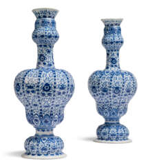 A PAIR OF DUTCH DELFT BLUE AND WHITE VASES