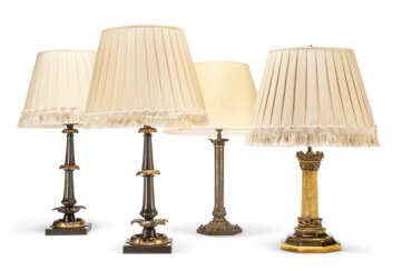 A GROUP OF FOUR BRONZE TABLE LAMPS