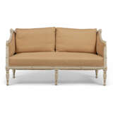 A NORTH EUROPEAN PARCEL-GILT AND WHITE-PAINTED CARVED WOOD AND COMPOSITION SOFA - фото 1