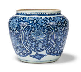A CHINESE BLUE AND WHITE REVERSE-DECORATED LARGE JAR