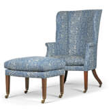 A GEORGE III MAHOGANY BARREL-BACK WING ARMCHAIR AND A LATER STOOL - photo 1