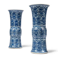 A PAIR OF CHINESE BLUE AND WHITE LARGE GU-FORM BEAKER VASES