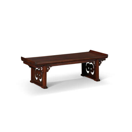 A HUANGHUALI RECESSED TRESTLE-LEG TABLE STAND - photo 1