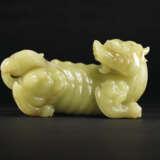 A VERY RARE LARGE YELLOW JADE CARVING OF A XIEZHI - photo 3