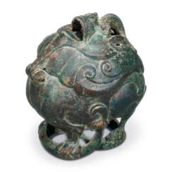 AN ARCHAIC BRONZE MYTHICAL ANIMAL FORM CENSER AND COVER