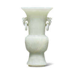 A RARE FINELY CARVED WHITE JADE VASE, GU