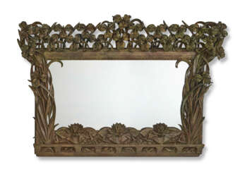 AN ART NOUVEAU CARVED FAUX-BRONZED GILTWOOD OVERMANTEL MIRROR