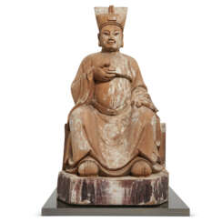 A CHINESE MING-STYLE CARVED WOOD FIGURE OF A SEATED OFFICIAL