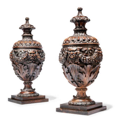 A PAIR OF ITALIAN RENAISSANCE REVIVAL CARVED AND STAINED PINE ORNAMENTAL URNS - photo 1