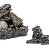 TWO JAPANESE PATINATED-BRONZE MODELS OF MYTHICAL BEASTS - photo 1