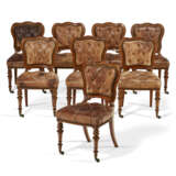 A SET OF EIGHT LATE VICTORIAN LEATHER-UPHOLSTERED MAHOGANY SIDE CHAIRS - photo 1