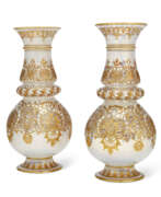 Style islamique. A PAIR OF LOBMEYR ENAMELED OPALINE GLASS VASES