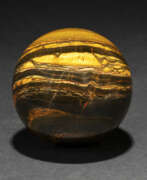 Тигровое железо. A LARGE SPHERE OF BANDED IRON TIGER EYE
