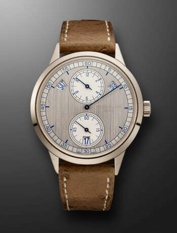 PATEK PHILIPPE, WHITE GOLD ANNUAL CALENDAR WITH REGULATOR-STYLE DIAL, REF. 5235G-001 - Foto 1