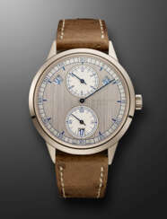 PATEK PHILIPPE, WHITE GOLD ANNUAL CALENDAR WITH REGULATOR-STYLE DIAL, REF. 5235G-001