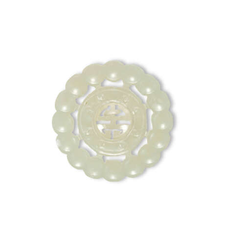 A GROUP OF ELEVEN WHITE AND PALE CELADON JADE OPENWORK ORNAMENTS - фото 3