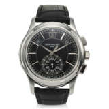 PATEK PHILIPPE, REF. 5905P-010, A FINE PLATINUM ANNUAL CALENDAR FLYBACK CHRONOGRAPH WRISTWATCH WITH DAY/NIGHT INDICATOR AND BLACK DIAL - photo 1