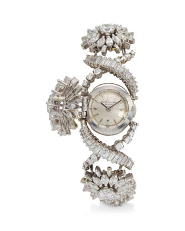 PATEK PHILIPPE, REF. 3215/39, AN EXTREMELY RARE AND IMPRESSIVE PLATINUM AND DIAMOND-SET BRACELET WATCH WITH HINGED COVER, THE ONLY KNOWN EXAMPLE - photo 1