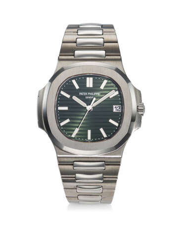 PATEK PHILIPPE, REF. 5711/1A-014, NAUTILUS, A VERY RARE AND HIGHLY DESIRABLE STEEL “GREEN DIAL” BRACELET WATCH WITH DATE - photo 1