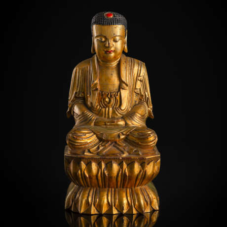 Figur des Buddha aus Holz mit Lackauflage und Vergoldung - Foto 1