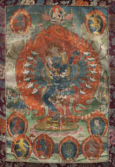 Thangka mit zentraler Darstellung des Hevajra in yab-yum mit seiner Gemahlin umgeben von Dakinis