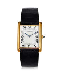 CARTIER, TANK LOUIS, A RARE 18K YELLOW GOLD “JUMBO” SIZED AUTOMATIC WRISTWATCH