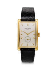 PATEK PHILIPPE, REF. 5009, GONDOLO, AN 18K YELLOW GOLD RECTANGULAR-SHAPED WRISTWATCH WITH SUBSIDIARY SECONDS