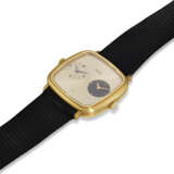 PIAGET, REF. 612773, AN 18K YELLOW GOLD CUSHION-SHAPED DUAL-TIME WRISTWATCH WITH TWO INDEPENDENT MOVEMENTS - photo 2