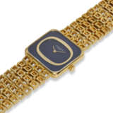 PATEK PHILIPPE, REF. 4183/1J-200, A FINE 18K YELLOW GOLD BRACELET WATCH WITH BLUE DIAL - Foto 2